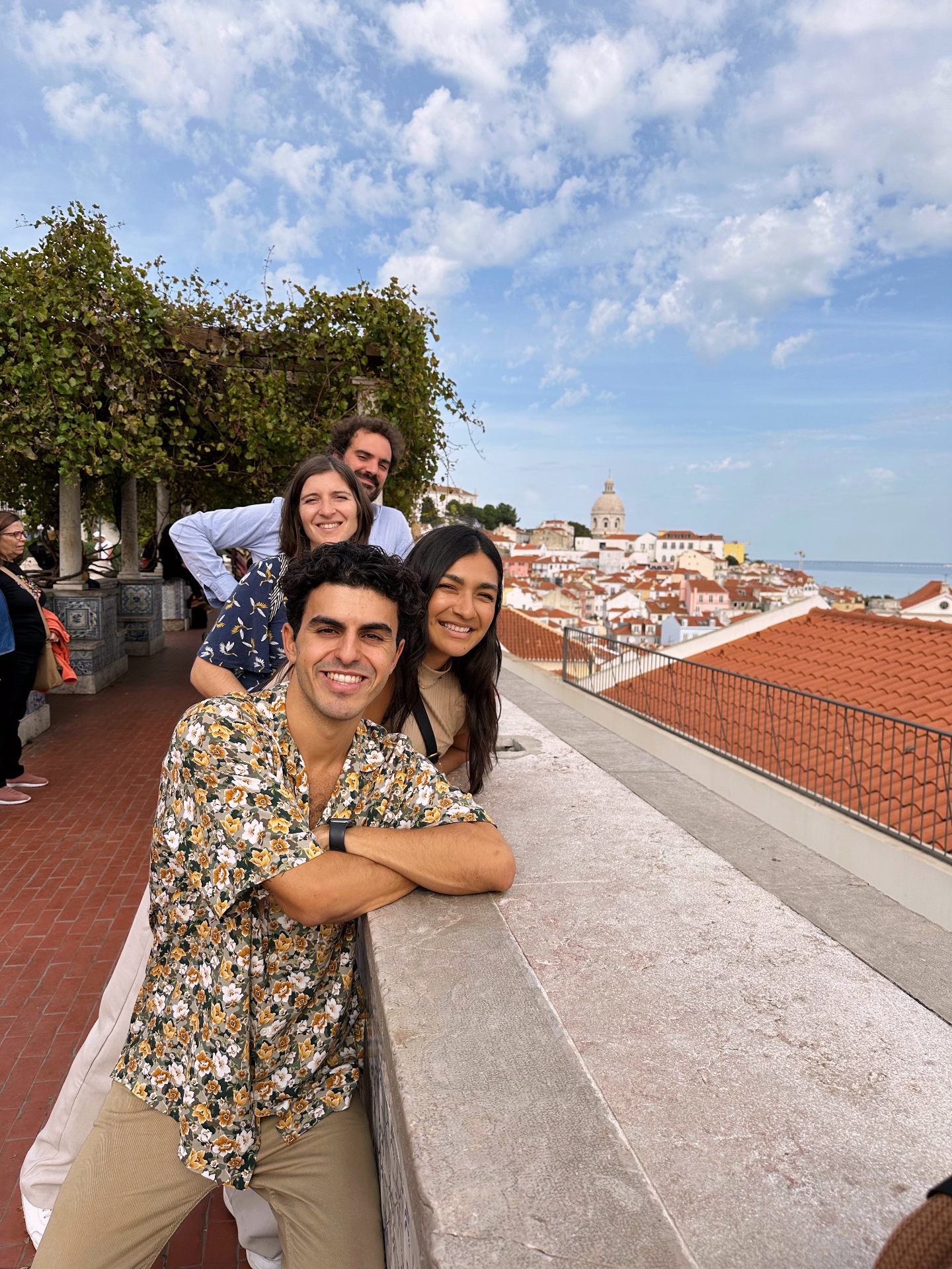 Collective of local artist hosts toasting in a Lisbon street